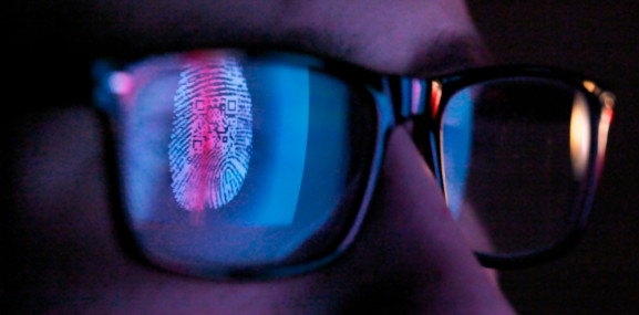 Fingerprint reflected in eyeglasses