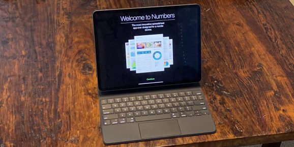 Is that a MacBook? No, it's an iPad Pro that converts into a laptop using Apple's new Magic Keyboard.