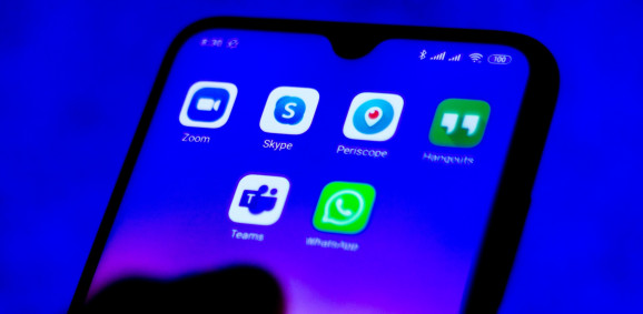 In this photo illustration social networks (Zoom, Skype, Periscope, Hangouts, Teams and WhatsApp) logos seen displayed on a smartphone.