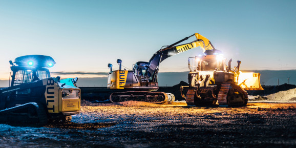 Built Robotics excavator and dozer on a construction site