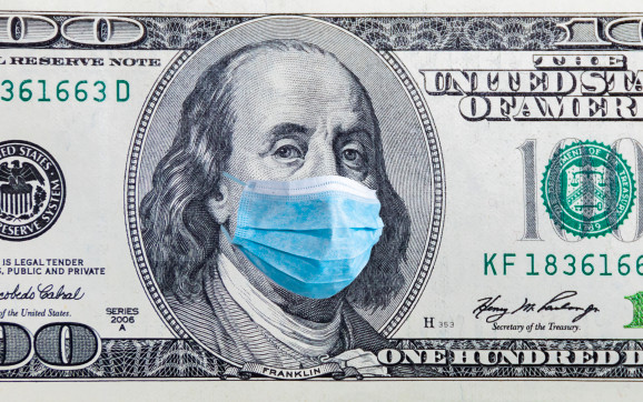100 dollar banknote with medical mask.