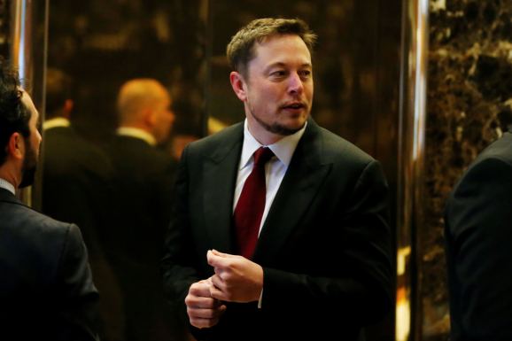 Tesla chief executive Elon Musk enters the lobby of Trump Tower in Manhattan, New York, U.S., January 6, 2017.