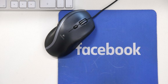 A mousepad with the Facebook logo is seen at Facebook's new headquarters, designed by Canadian-born American architect Frank Gehry, at Rathbone Place in central London on December 4, 2017.