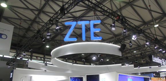 SHANGHAI, CHINA - JUNE 26: People visit the ZTE booth on day one of the Mobile World Congress (MWC)
