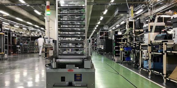 A self-driving vehicle with parts is pictued at Ricoh?fs photocopier components factory in Atsugi, Kanagawa prefecture, Japan July 13, 2020.