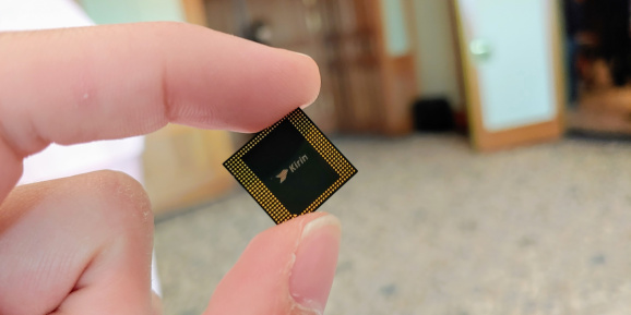 A mock-up of the Kirin 990 5G system-on-chip.