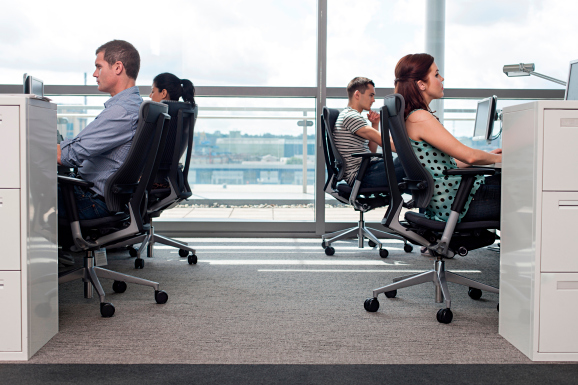 people in office focused on work